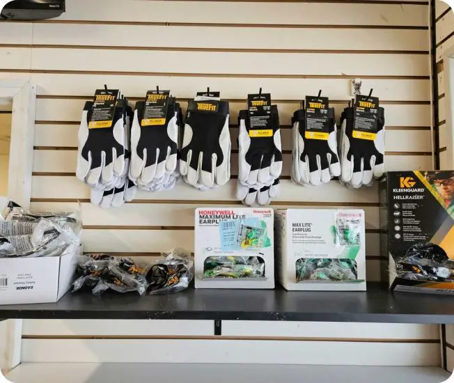 Work gloves and earplugs for sale.